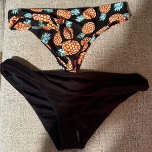 Two swimsuit bottoms both size Large